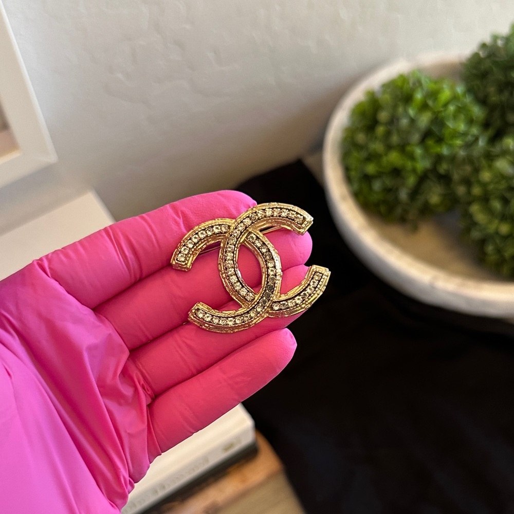 CHANEL Gold - Toned Brooch with Crystal Details